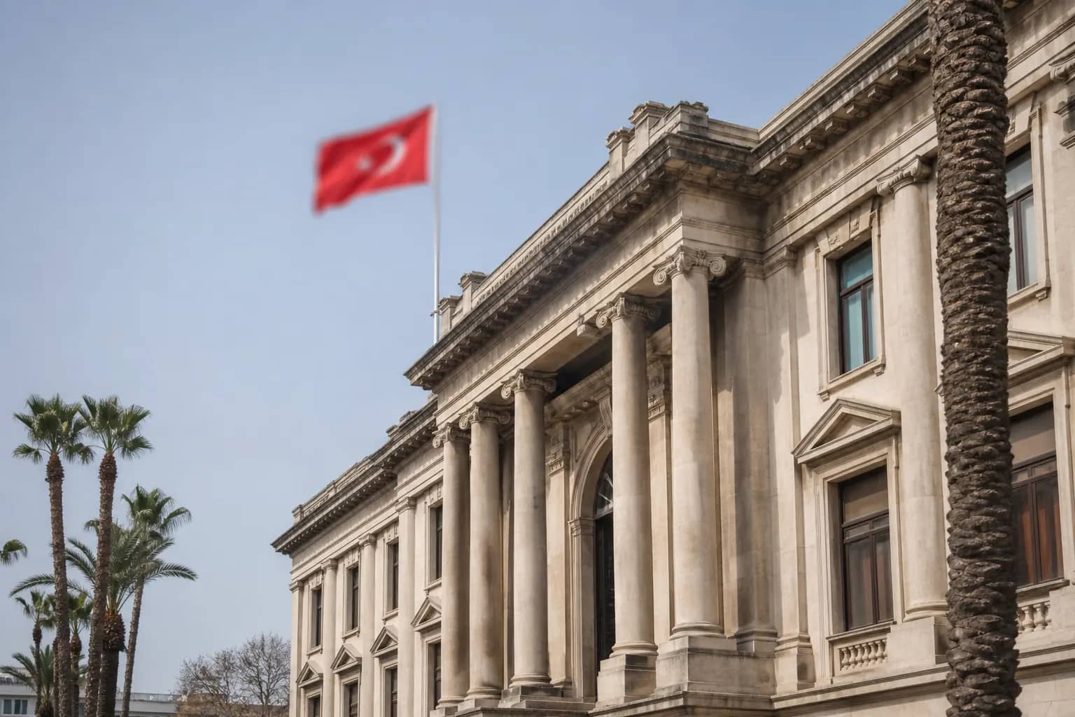 İzmir'de resmi kurum binası ve Türk bayrağı, bakanlık ruhsatı başvuru sürecini temsil eder